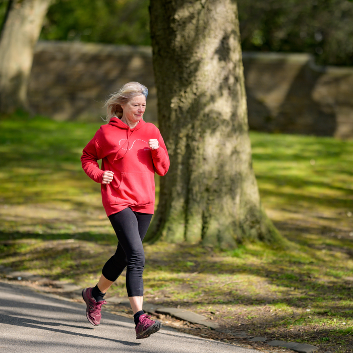 Photo by Centre for Ageing Better: https://www.pexels.com/photo/girl-in-red-hoodie-and-black-leggings-jogging-7849902/